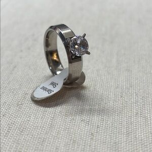 CZ solitaire set in stainless steel band